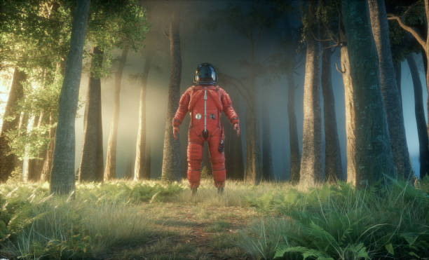 istock Cosmonaut in the forest. Sci fi and fantasy concept. 1459130537