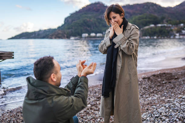 istock Young man proposes to his girlfriend at Valentine's Day 1459131896