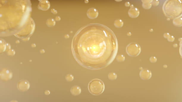 Cosmetics Golden Serum bubbles on defocus background stock photo