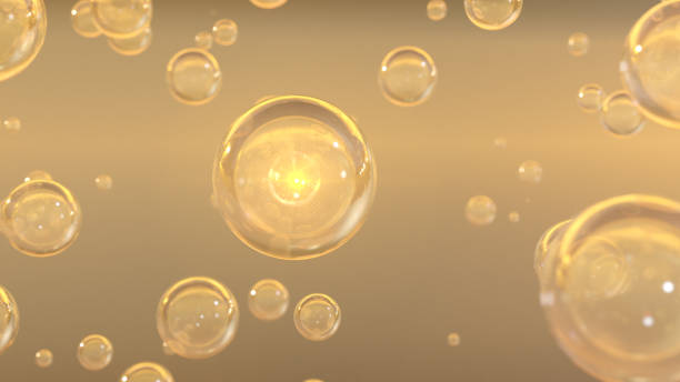 3D cosmetic rendering Bubbles of Golden Serum against a blurred background stock photo