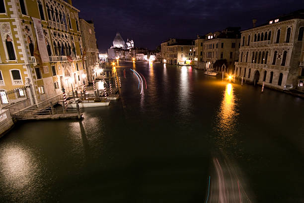 istock Venetian canal at night 145913413