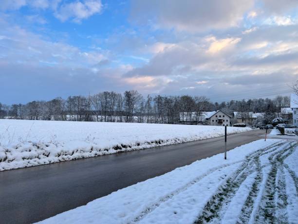 istock snow covered road and beautiful sky 1459134612