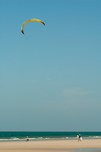 hua hin thailand  may - 4 2006  an unknown kite surfer in thailand on a beach in hua hin