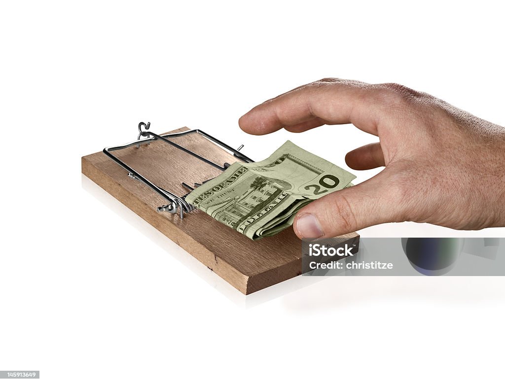 Financial Mouse trap (with hand) A mousetrap attracting a greedy hand. Can be used as a concept for risky investing. Mousetrap Stock Photo