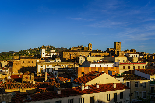 Caceres, Extremadura, Spain. 04/16/2022. Rooftop view of Caceres at nightfall