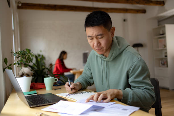 istock Let me see how much should I pay for this bill! 1459139287