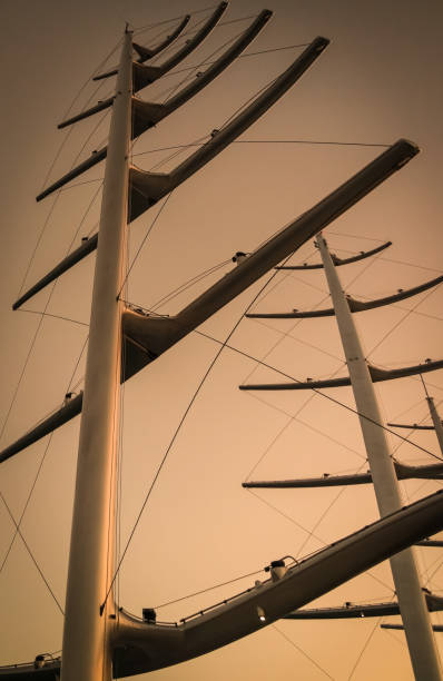 Masts like herringbone on a luxury Yacht.