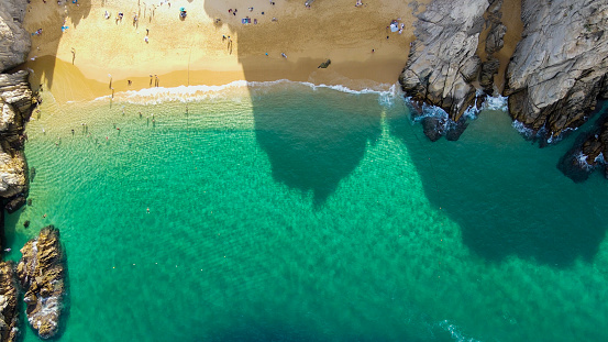 Drone Panorama Cabo San Lucas Lover's Beach on a Sunny Day with Pretty Clouds