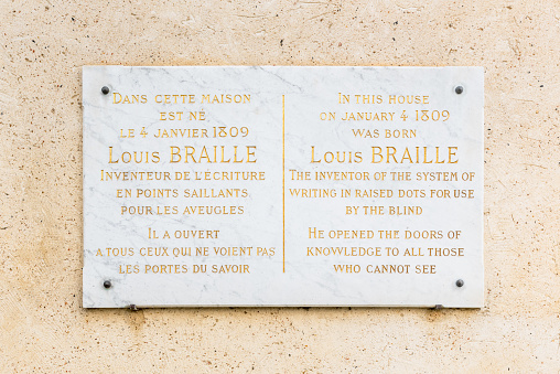 Coupvray, France - January 15, 2023: Memorial Plaque at the Birthplace of Louis Braille in Coupvray, France. Louis Braille is the inventor of Braille, the reading and writing system intended for use by visually impaired people. His system is used worldwide and remains virtually unchanged to this day.