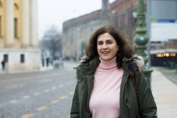 istock Happy mature woman taking a break during their vacation 1459142369