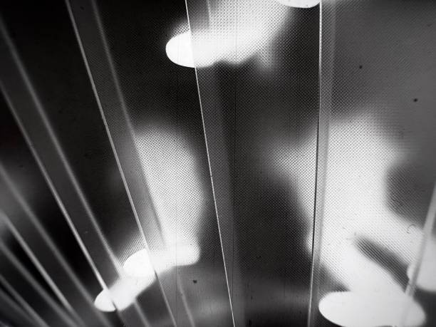 Shadows cast across a domestic bedroom