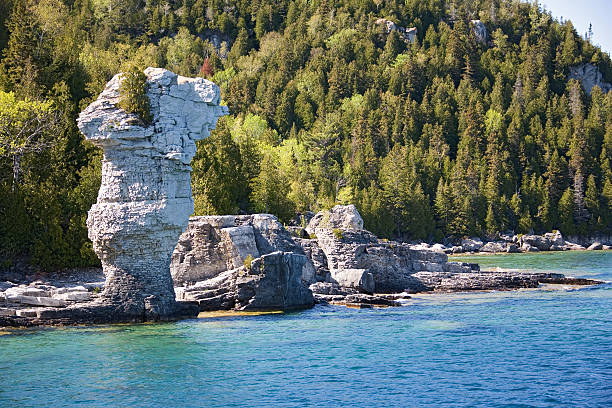 tobermory view from boat to rocks close stock photo