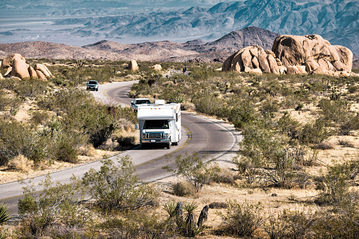 RV drives in Joshua Tree National Park, California, USA.