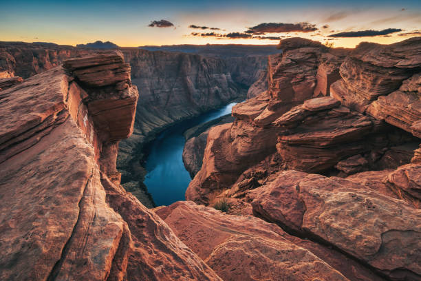 Horseshoe Bend Rocky Cliffs Detail Arizona Dramatic Sunset and landscape at Horseshoe Bend, near Page, Arizona, USA. horseshoe bend river stock pictures, royalty-free photos & images