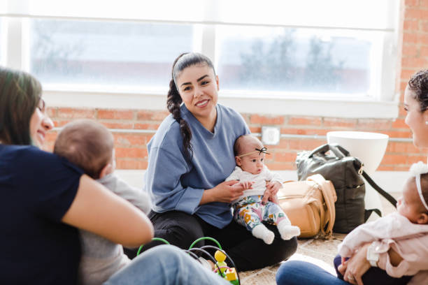 istock Diverse young moms with babies meet for support group 1459157262