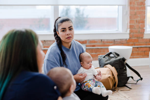 istock Young mom empathizes as unrecognizable friend shares 1459157267