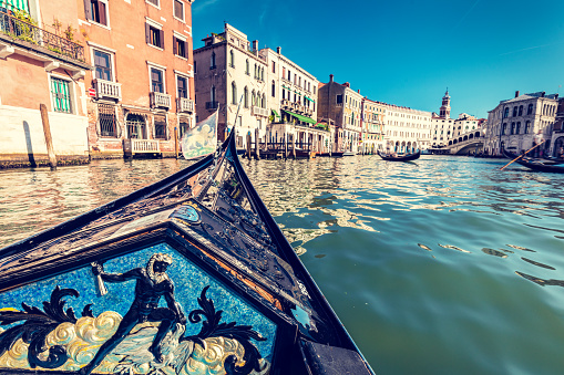 Venice, Italy - September 09th, 2021: A view of the canals and gondolas as the city start to reopen in the centre of Venice during the easing of the corona virus lockdown in the Autumn of 2021 in the centre of Venice, Italy
