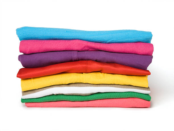 istock Pile of multi-coloured clothes 145915986