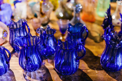 Murano glass exhibition of handmade glassware at workshop in Murano, Italy. Traditional craft art