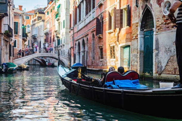 istock Gondola on canal in Venice, Italy. 1459163173