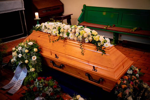 istock floral decoration on coffin and urn 1459163183
