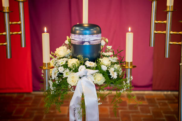 istock floral decoration on coffin and urn 1459163225