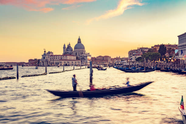 istock Gondola ride in Venice, Italy at sunset. 1459163648