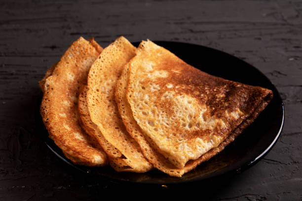 istock photo three fried pancakes on a plate 1459167218