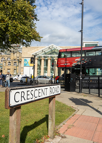 Crescent Road at Harrogate in North Yorkshire, England, with people in the background.
