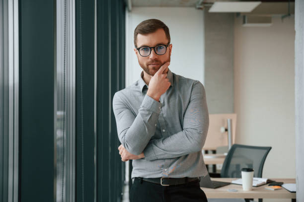 istock Businessman in formal clothes is working in the office 1459169665