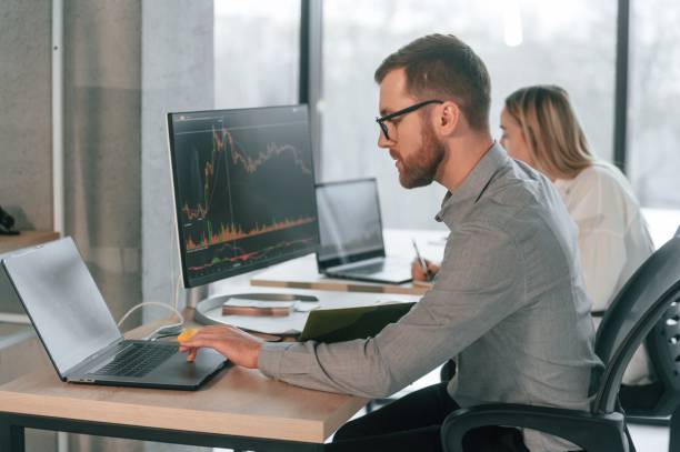 istock Conception of business. Successful team are working together in the office 1459169846