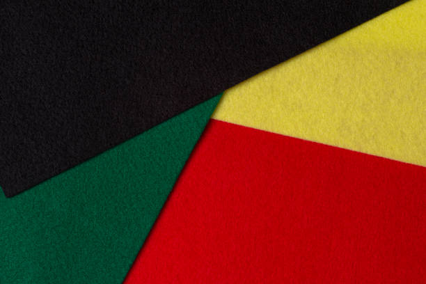 istock Black History Month color background with copy space for text. Geometric felt textile background in black, red, yellow, green colors 1459170172