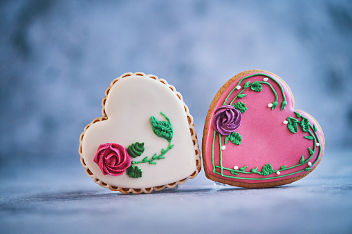 Heart shape cookie molds on white background,soft focus