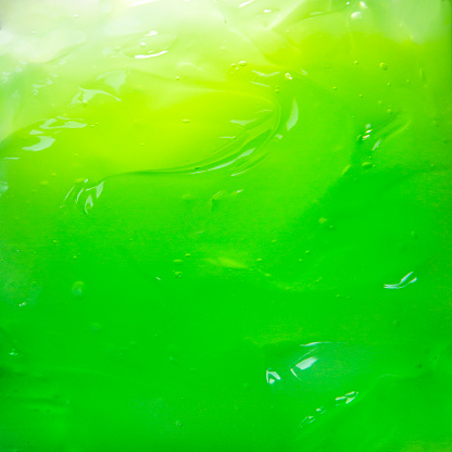 Extreme close-up of green gel texture.