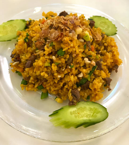 istock Fried rice with meat and cucumber. 1459175120