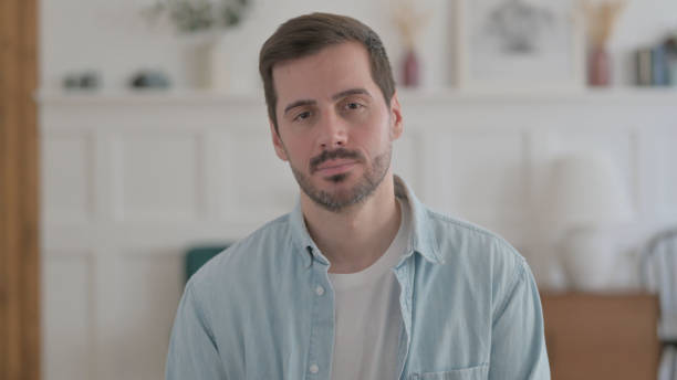 istock Portrait of Sad Young Man Feeling Upset and Crying 1459176439