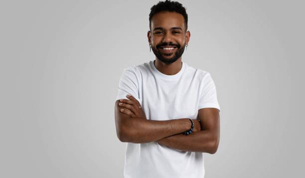 istock Handsome young african american guy posing in studio - isolated 1459176850