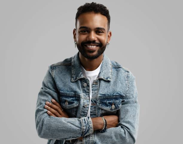 istock Handsome young african american guy posing in studio - isolated 1459177467