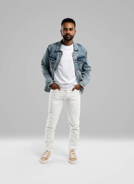 istock Handsome young african american guy posing in studio - isolated 1459177521