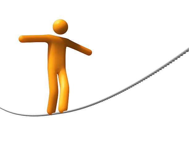 istock Image of an abstract person walking a tight rope 145917807