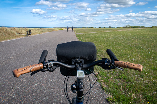 bicycle on baltic bike lane, german name: Ostseeküstenradweg, concept shot for active vacations