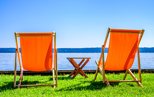 lounge chairs at a beach - italy