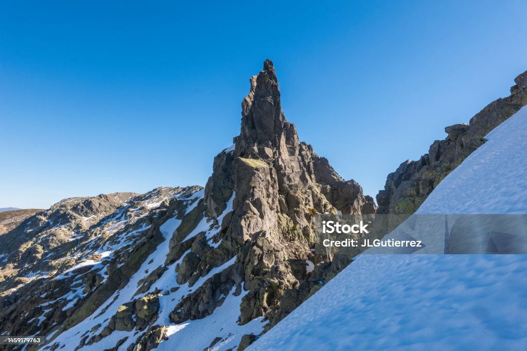 Icy mountains and peaks in winter in Sierra de Gredos, Spain Adventure Stock Photo