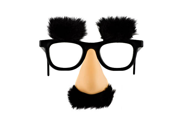 Fun fake mask lisolated on white background Fun fake mask lisolated on white background groucho marx disguise stock pictures, royalty-free photos & images