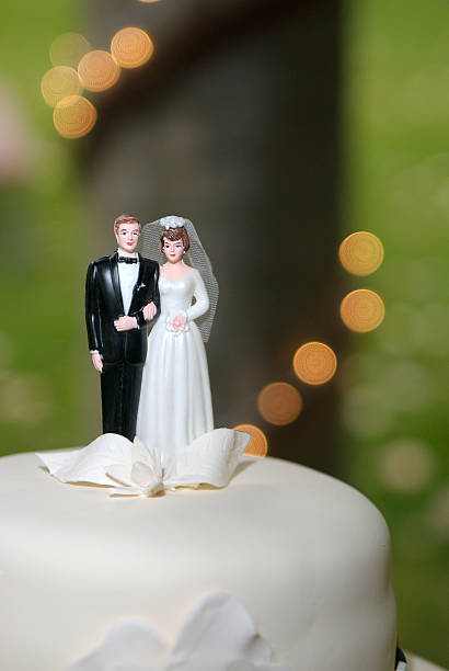 istock Bride and groom topper for a wedding cake 145918248
