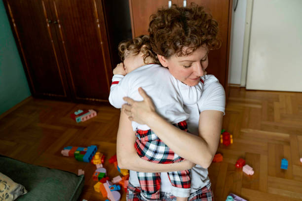 istock Mother with her daughter on a shoulder 1459184155