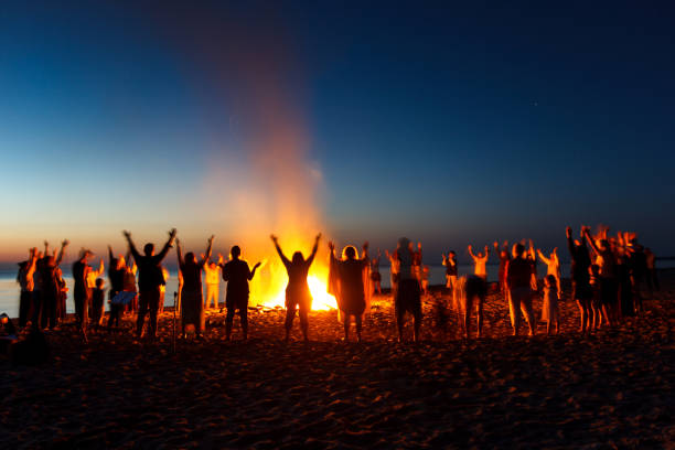 The Night of Ancient Bonfires The Night of Ancient Bonfires. On the last Saturday of August, each year the end of the summer is celebrated by the lighting of bonfires. Bonfires and signal fires will be lit in hundreds of places around the Baltic coast. ceremony stock pictures, royalty-free photos & images