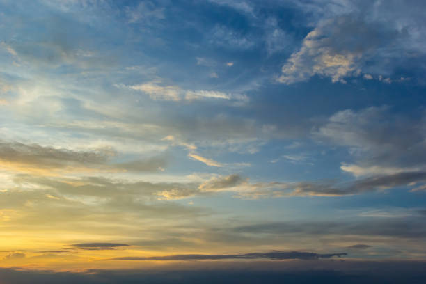 istock clouds in the sky illuminated by the sun summer evening. background 1459185259