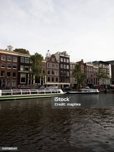 Typical Amsterdam Buildings On Prinsengracht Next To Dutch Anne Frank House Huis Museum In Holland Netherlands Stock Photo - Download Image Now