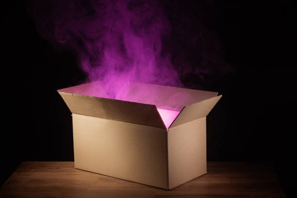 istock mysterious box opening with rays of light, mysterious gift concept 1459191025